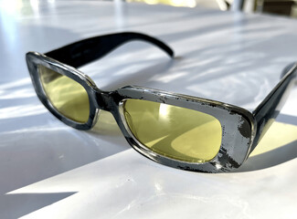 Retro-Style Sunglasses with Yellow Lenses and Distressed Silver Frame