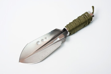 Metal tourist shovel, multitool with a comfortable handle.