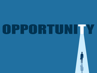 Businessman in front of new business opportunity door shining light