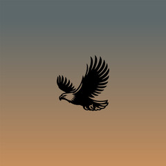 Illustration of an eagle silhouette flying at sunset