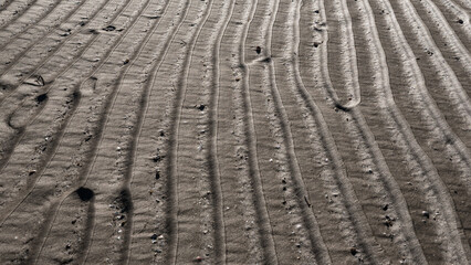 SEA BEACH - Wavy wet sand on the coast