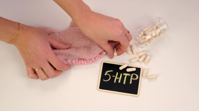 5-HTP sleep supplement capsules. Selective Focus.