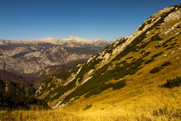 panoramic view from Vogel ski resort in Slovenia in Triglav National Park. Photo taken in autumn. Cloudless sky during the day.