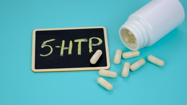 5-HTP sleep supplement capsules. Selective Focus.