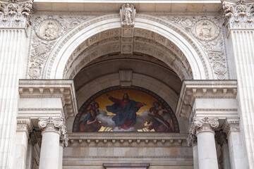 Tympanum with mosaic Our Lord on the Throne with Angels on main facade of St.Stephen`s Basilica is Roman Catholic basilica in Budapest, Hungary