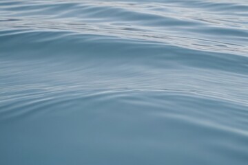 Gentle Water Ripples Flowing Across the Surface of a Blue Ocean