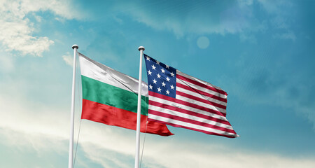 Bulgaria and America friendship flags are waving in the sky.Two country flag for agreement or deal. Bulgaria USA national flag for comittment.