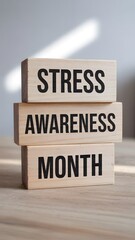 "Stress Awareness Month" blocks, symbolizing mental health awareness, self-care, and promoting well-being resources.
