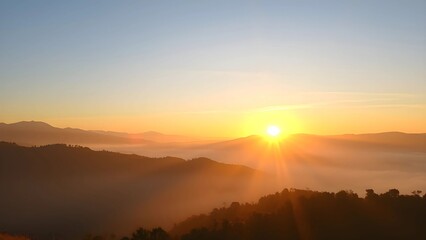"First Beautiful Dawn of Spring – Serene Sunrise Over Misty Mountains"