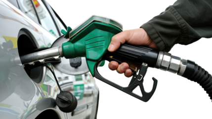 Fueling Up: A close-up view showcases a hand gripping a fuel nozzle, refueling a vehicle. This image captures the essential process of fueling up for travel, a daily ritual for many.