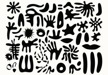 Abstract Shapes Composition: A collection of diverse, black abstract shapes on a flat background.