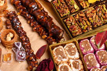 Sweet food Turkish delight on wooden background, assorted locum and candy as decorated backdrop