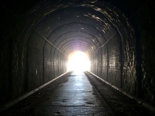 A bright light in a black tunnel 