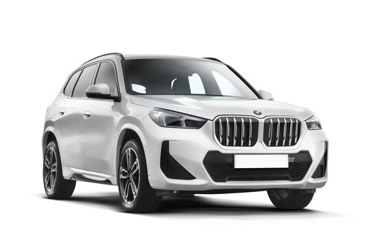 Front right angled view of 2024 BMW X1 S Drive 2.0i with transparent background showcasing dynamic and refined exterior design.