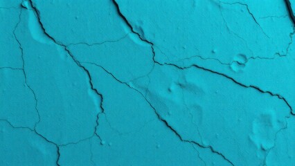 Obraz premium a close-up of a cracked surface, featuring a vibrant turquoise color. The cracks vary in size and shape, creating an interesting texture that draws the eye.