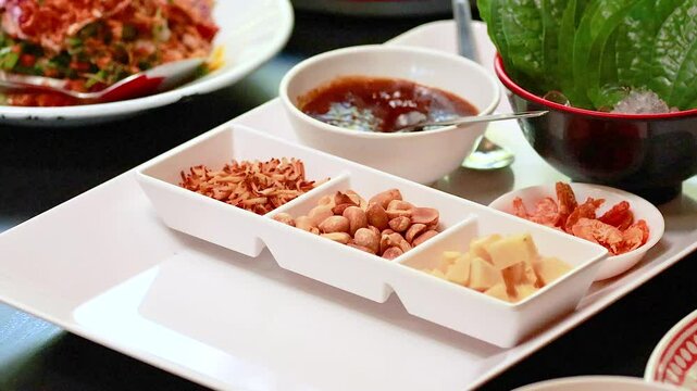 Preparing Miang Kham in Phuket, Thailand