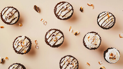 Chocolate cupcakes with frosting and nuts on a light background  