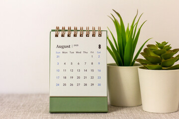 Hello August, August 2025 desk calendar for planning.