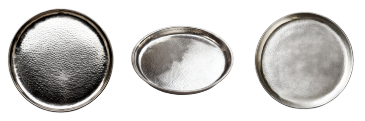 Three hammered metal serving platters.