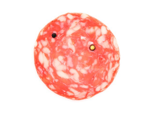 One slice of tasty smoked sausage with spices on white background, top view