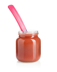 Baby food. Tasty puree in glass jar and spoon isolated on white