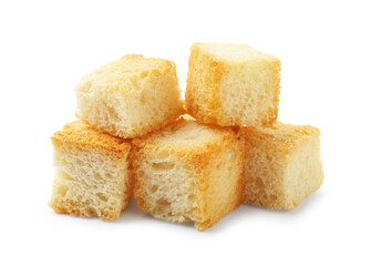 Many delicious crispy croutons isolated on white