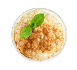 Delicious rice pudding with cinnamon and mint in glass dessert bowl isolated on white, top view