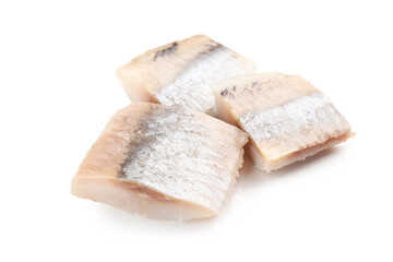 Pieces of delicious herring isolated on white