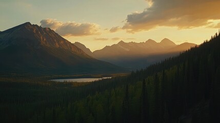 Obraz premium Mountainous landscape at sunset over a lake. Possible use Stock photo for nature, travel, or scenic backgrounds