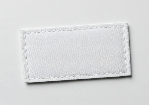 Blank White Fabric Patch with Stitched Border - Customizable Label Tag Template for Branding and Design.