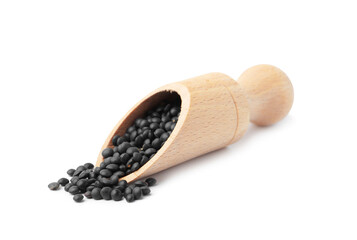 Raw lentils in wooden scoop isolated on white