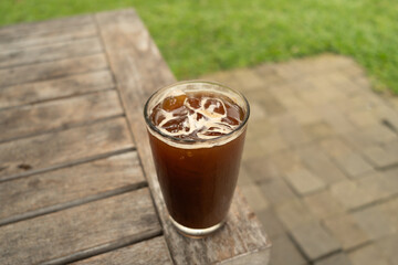 glass of iced americano coffee or Cold Brew on a table