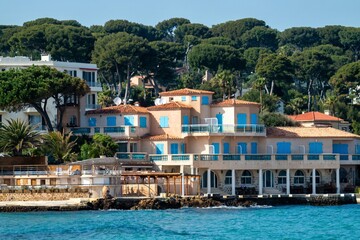 Cap D antibes beach and sea with pine trees and villas in France
