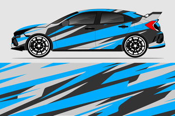Obraz premium Vibrant blue and black sports car with dynamic graphics on a gray background, showcasing modern design