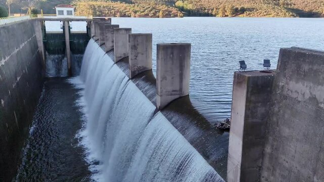 The Yeguas Reservoir in Andalusia, southern Spain, releases water after reaching 100 percent of its capacity following numerous spring rains.