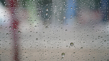 Raindrops on the glass, focus selected