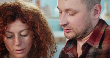 Collaborative drawing session in art studio with two creators sharing ideas and techniques in a cozy environment