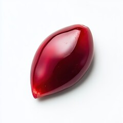 A single pomegranate seed in close-up, isolated on a white background. Featuring vibrant color and texture
