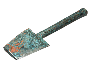 Antique patinaed metal tool, possibly a trowel or small shovel, rests on a white background.