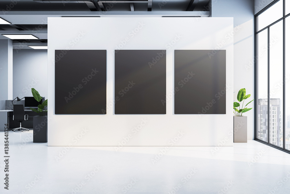 Poster three blank black posters on white wall in modern office interior with large windows and city view, 