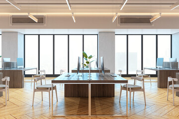 Modern open office interior with wooden floors, minimalist furniture, large windows, and natural daylight view in urban high-rise building room. 3D Rendering