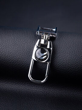 Novosibirsk, Russia -  march    03 , 2024:  close-up of  Citroen   keychain  on black  background