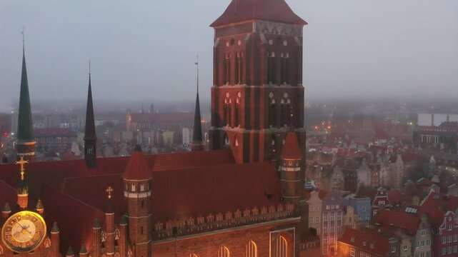 Beautiful architecture of the St. Marys Cathedral in Gdansk at foggy morning. Poland