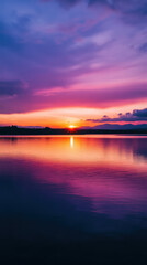 A Sunset Over the Water: A serene view of a beautiful sunset with water reflecting the vibrant colors of the sky and the sun's golden glow, creating a tranquil, picturesque landscape.