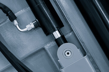 pipes connected to industrial hydraulic pneumatic machine, industrial concept background