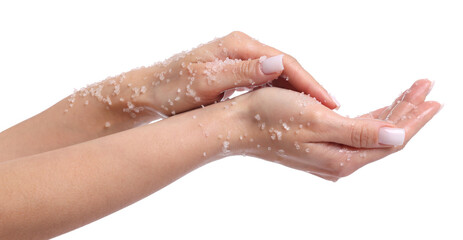 Woman applying body scrub onto her hands on white background, closeup