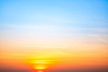 Sky,sunset, beautiful , luxury soft gradient orange gold clouds and sunlight on the blue sky perfect for the background, Sunrise on morning or evening in winter warm time ,Twilight summer,silhouette
