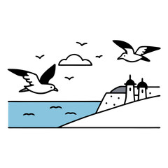 Seagulls flying over a picturesque coastline