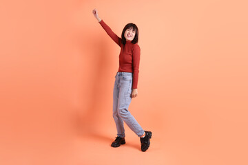 20s woman in red long sleeve t-shirt