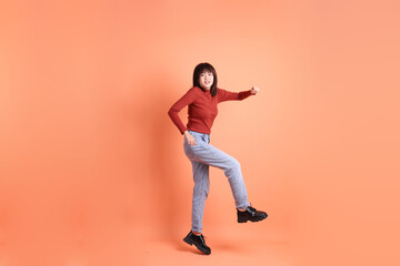 20s woman in red long sleeve t-shirt